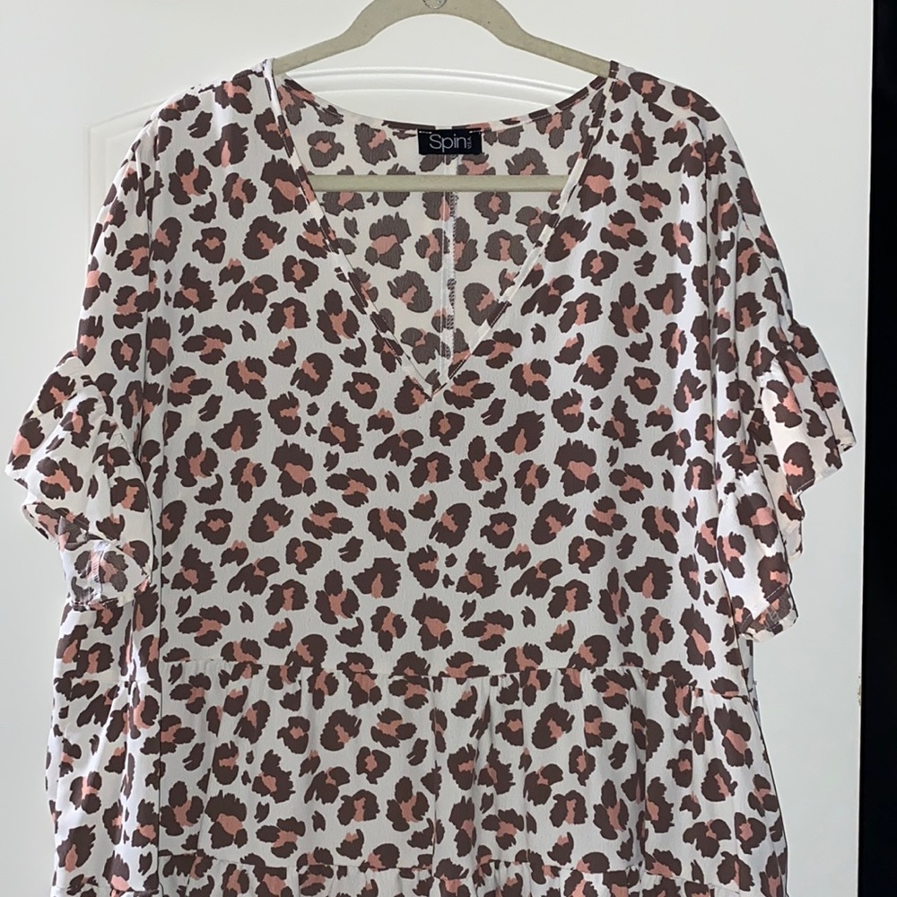 Beautiful leopard print blouse with hints of coral